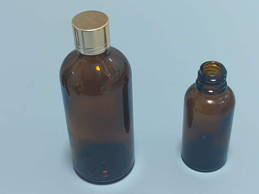 Imballaggio dell' olio essenziale 1OZ 2OZ 20ml 30ml 50ml siero di olio essenziale di ambra Bottiglia gocciolante di vetro con tappo a prova di bambino