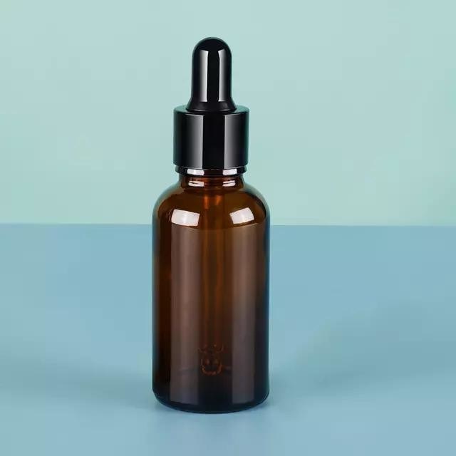 Sero per il trucco di lusso personalizzato per la cura della pelle Utilizzare ambrato marrone Bottiglie gocciolanti di olio essenziale vuote con pipetta