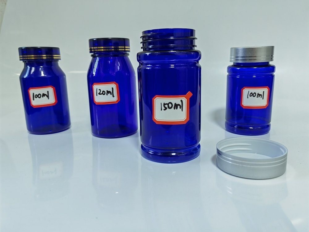 Bottiglia di compresse in PET blu di plastica da 100 ml con tappo a vite d' argento