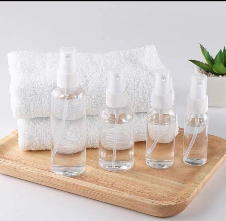 50ml 60ml 100ml PET trasparente rotondo personalizzare riempitibile disinfettante per mani rotondo riempire cosmetici PET bottiglia spray di plastica